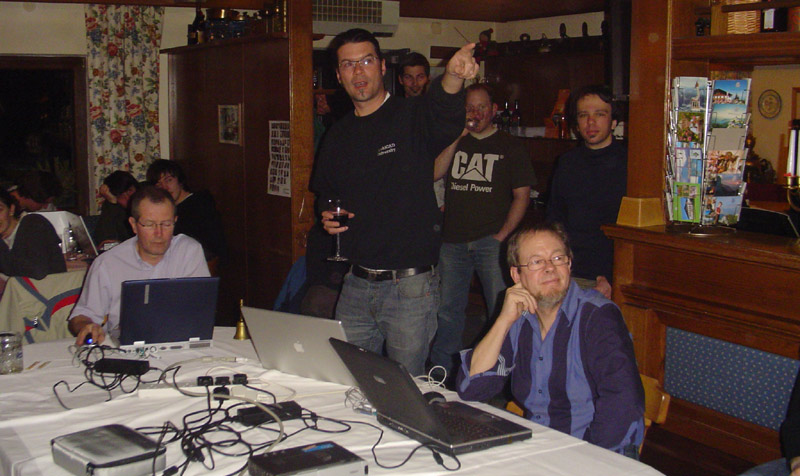 Howard Gill (left) and Adrian Harms (right) talking about Hotlinked modules, and Andreas Lettner (centre) reinforcing an important point.