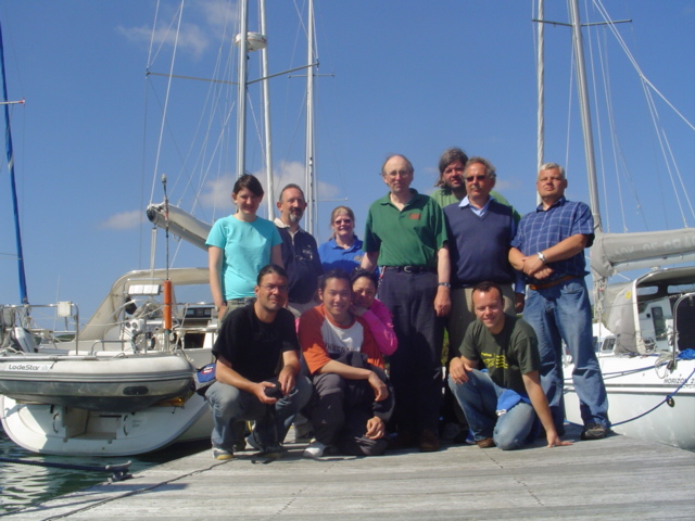 Group photo at Lawrence Cove, Bere Island, and the two yachts